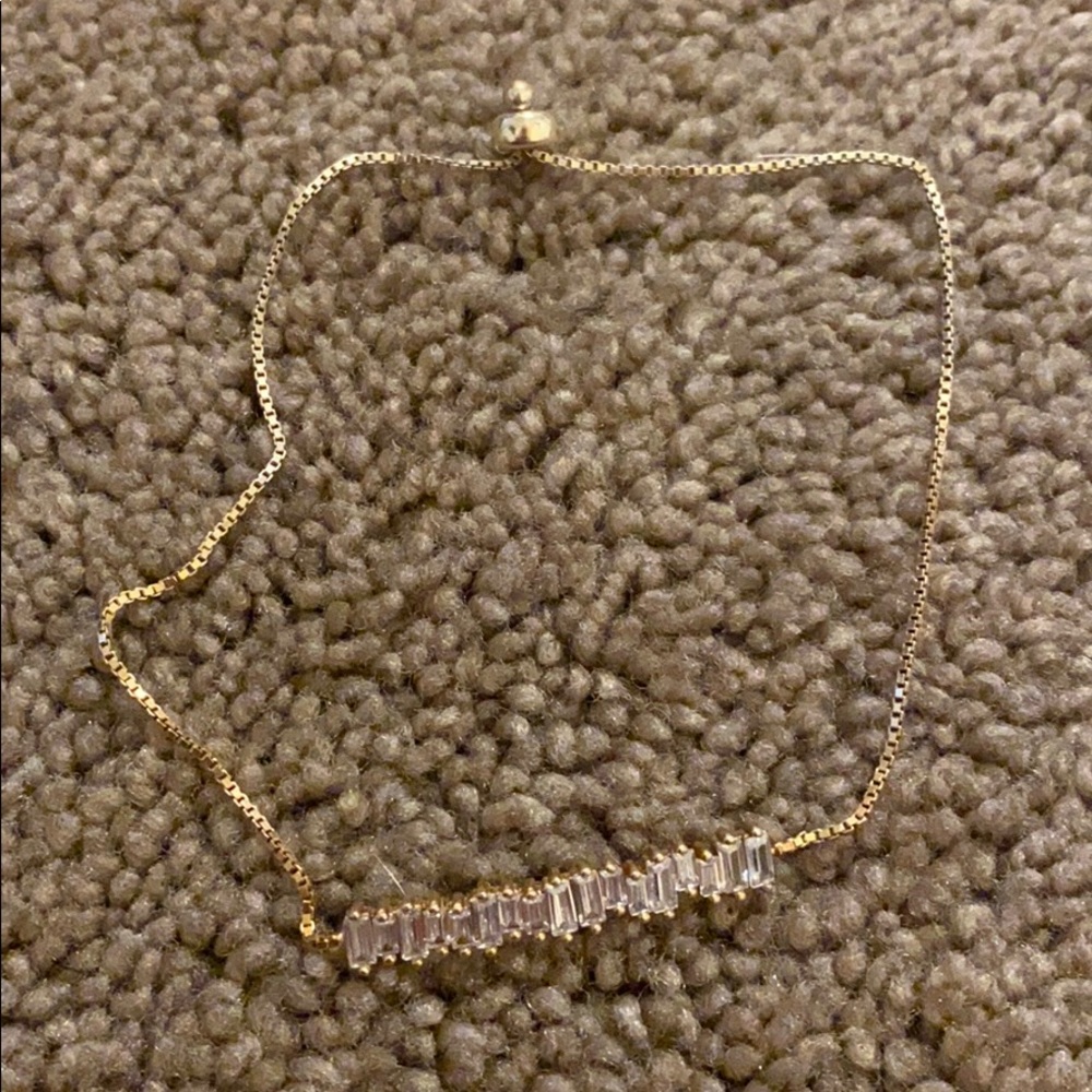 gold bracelet with silver decoration